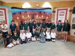 Students in front of a theater display