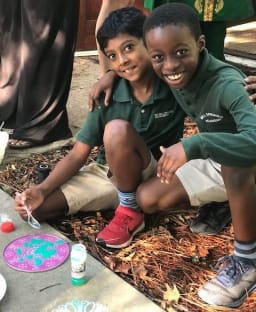 Boys creating a mandala