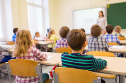 Elementary students in class sitting at desks