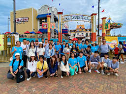 Students enjoying a theme park during ILTexas Summer Camp