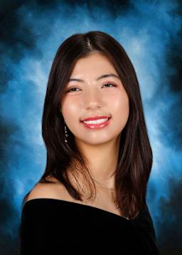 The image shows a young woman with long dark hair and a warm, friendly smile against a blue background.