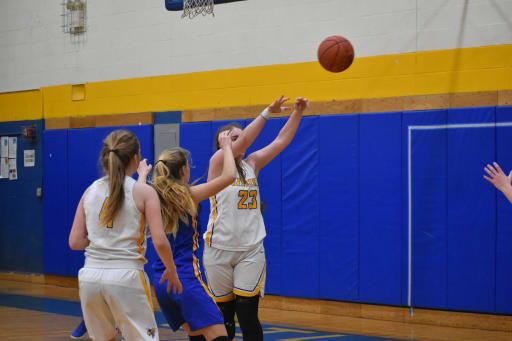 Girls Varsity Basketball Team Keeps Pressing Forward Post The