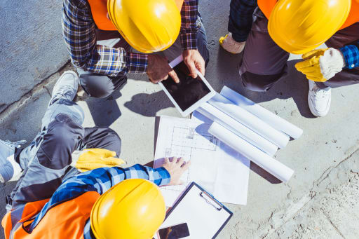 Students learning at a construction site
