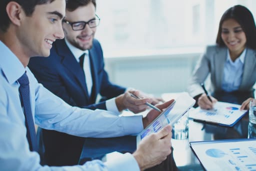 Students learning about information technology in a conference room