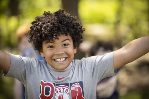 Student smiling out on the playground.