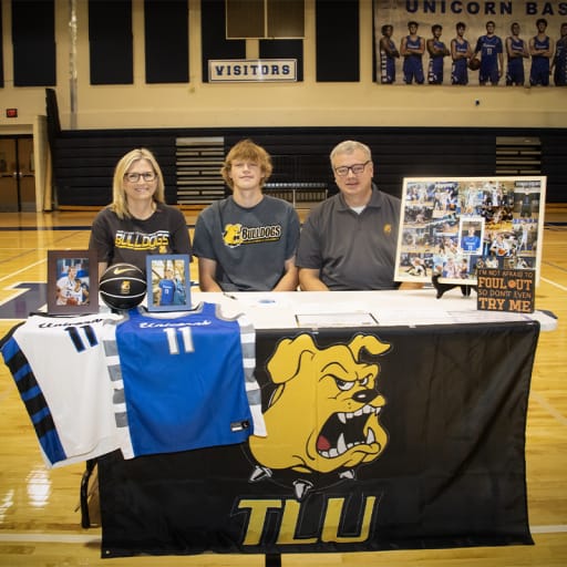 Carter Lewis of the Unicorn basketball team signed with Texas Lutheran University