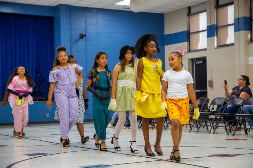 Students show off their handmade clothing during a fashion show | News Item  - Independent School District No. 1 of Tulsa County,