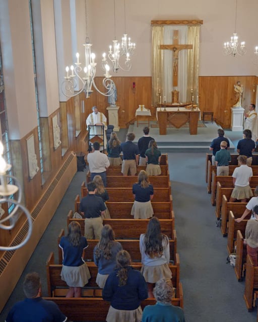 Students in the school chapel for mass