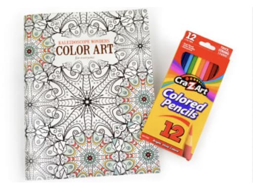 Adult coloring book with intricate kaleidoscope patterns next to a pack of 12 Cra-Z-Art colored pencils. The scene conveys creativity and relaxation.