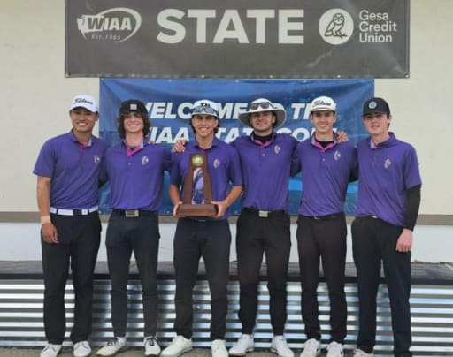 Golf athletes show off state championship trophy