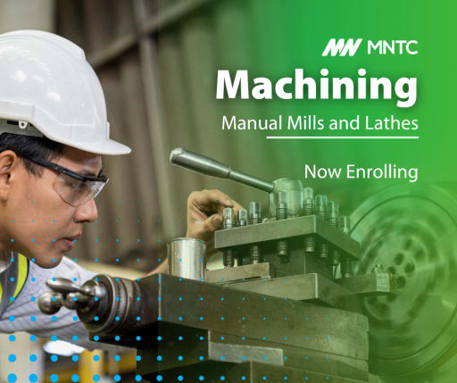 Machinist working with mills and lathes in training.