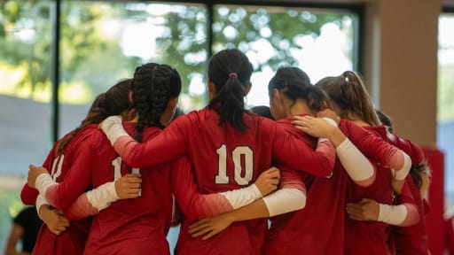 Volleyball team huddle