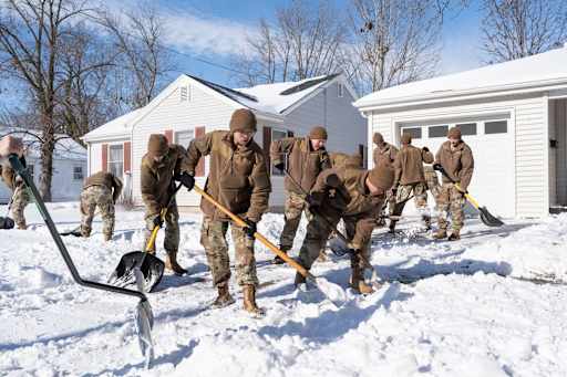 Missouri Military Academy cadets shovel snow for their Mexico, MO, neighbors