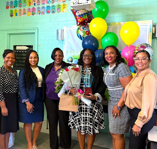 Ms. Cherise C. Davis, with Administrators from the St. Croix District