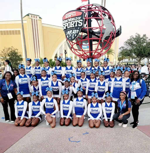 Cheerleading Team poses by the ESPN Wide World of Sports complex.