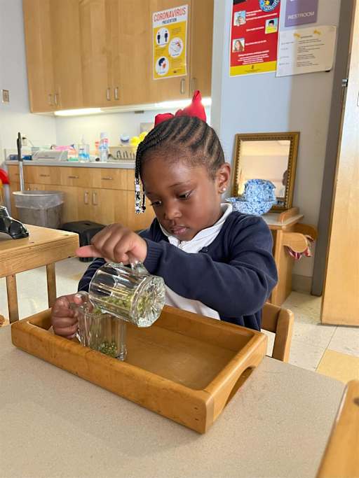 Young girl working on a fine motor skills activity