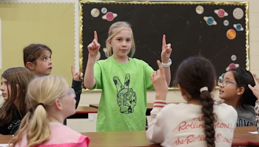 Students Using Sign Language