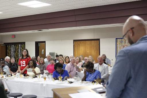 Transportation Department Director Chad Ivester recognizes six retirees from his department including four bus drivers plus Transportation Coordinator Juanita McMillan and former director Julie Chance, Ed.D.