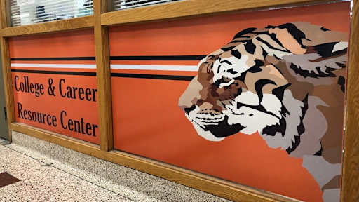 Hallway Signage for CRC outside their office entrance including wildcat art