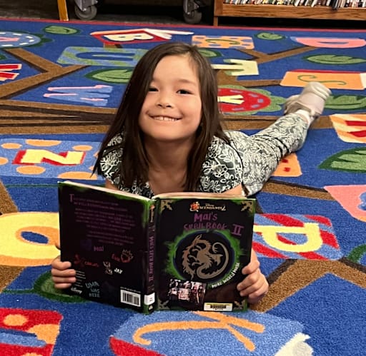 Stanley students reading together in the library