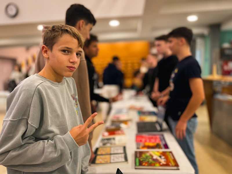 Secondary students visiting club tables at the Clubs Fair