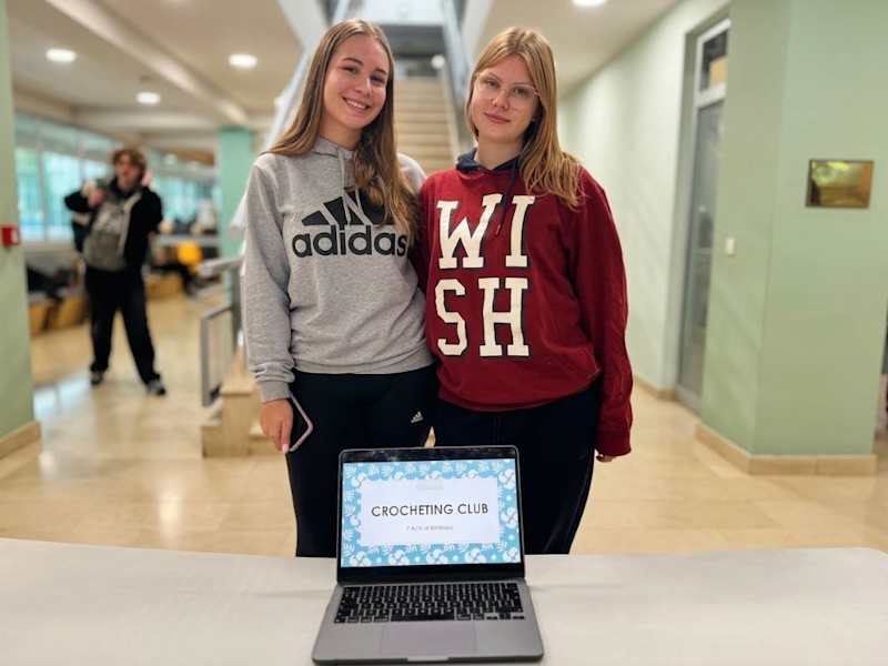 Two Crochet Club members at their table during the Clubs Fair