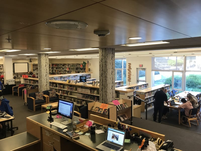 Students and teachers hard at work amongst the books and computers in Northsore Middles School's library