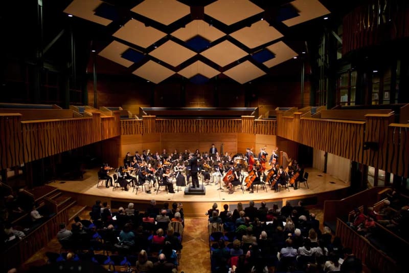 Hotchkiss Orchestra on stage in Elfers Hall