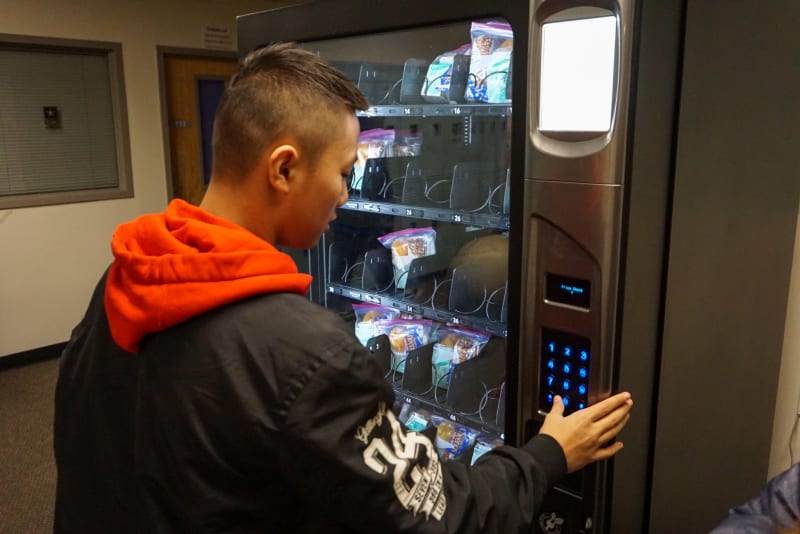 Tyee students uses a new breakfast vending machine.