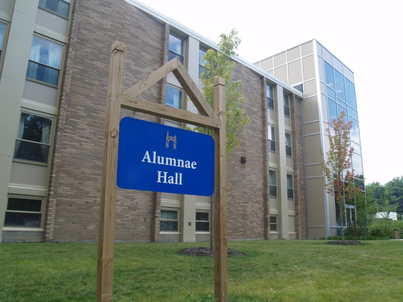 Alumnae Hall campus sign