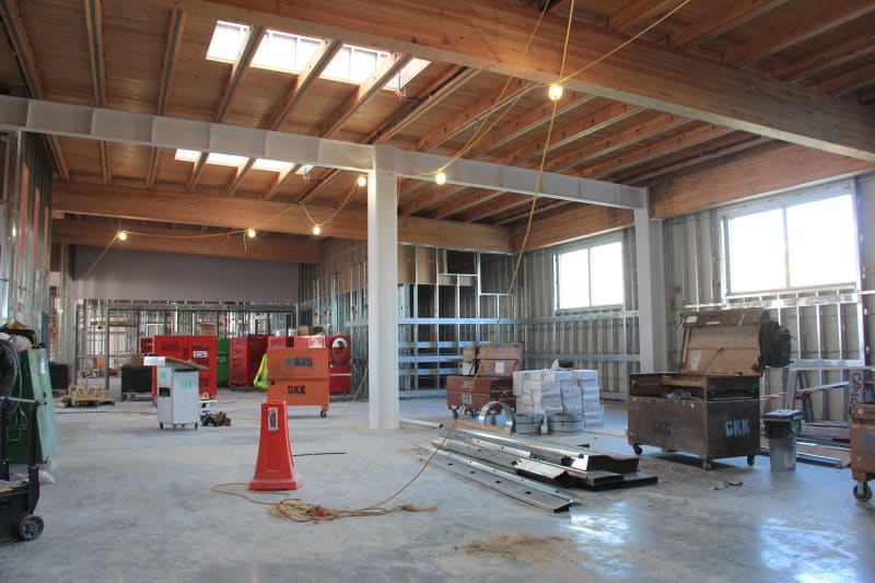 View of library interior with skylights and natural wood ceiling (January 14, 2021).