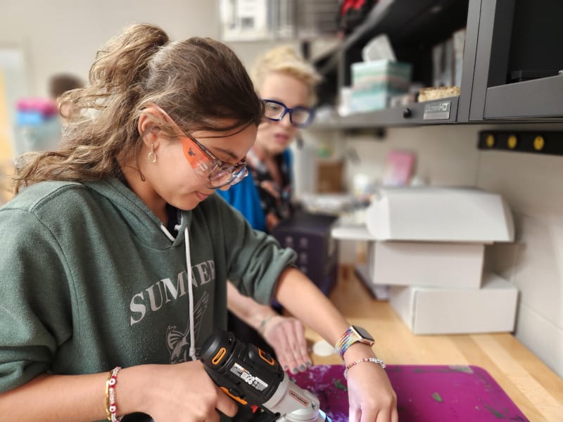 A Sumner Academy student working on a hands-on project in the IDEA HUB.