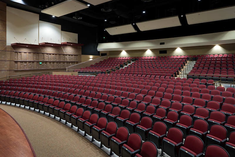 panoramic image of performing arts center empty chairs