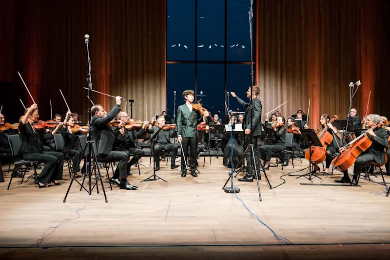 students performing classical music in the Auditorium of the Moghadam Campus Hub