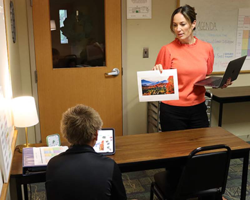 Teacher working with student in the Center for Integrated Learning