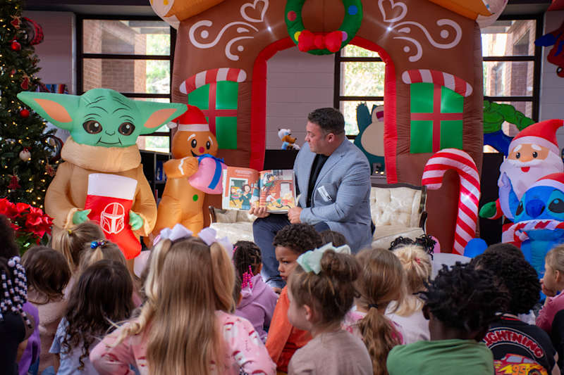 Group of SES Pre-K Students being read to