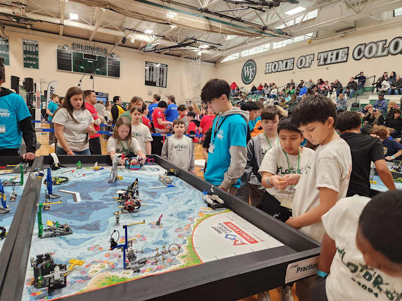 students participate in robotics LEGO League qualifier
