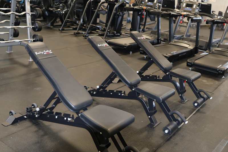 Three incline weight benches.