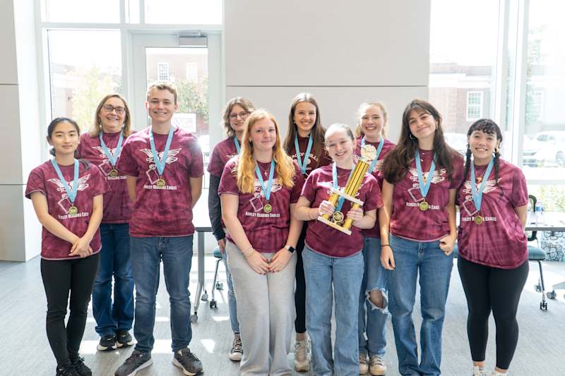 Ashley High School Battle of the Books team celebrating with their trophy