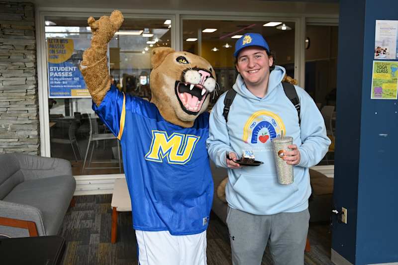 Misericordia University student celebrating with Archie
