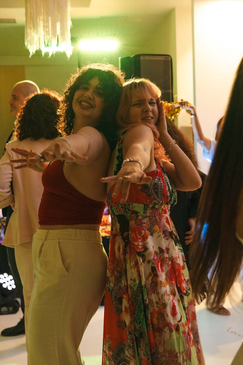 Guests dancing together at the Closing Ceremony party