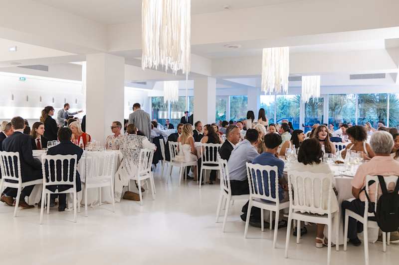 Guests seated together at the Closing Ceremony dinner