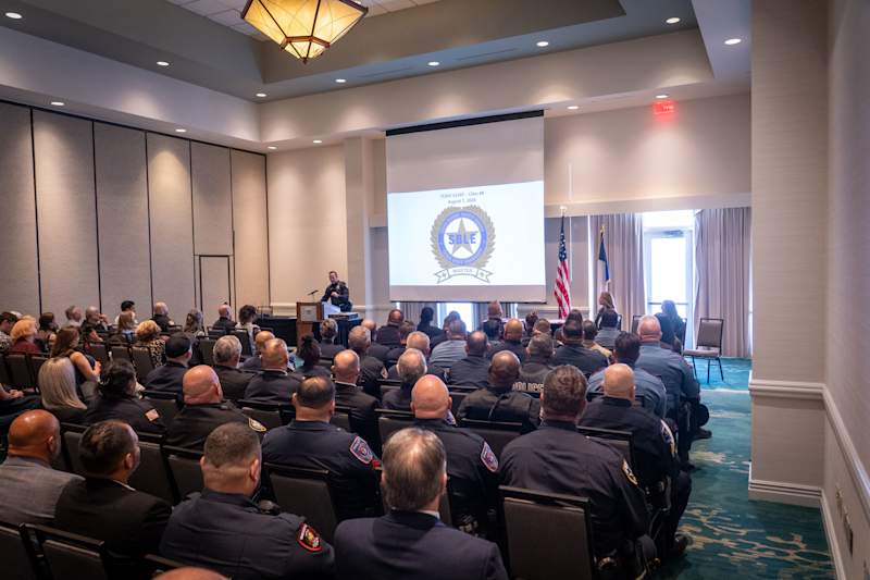 Police officers attend a presentation during the TCOLE SBLE Master Training