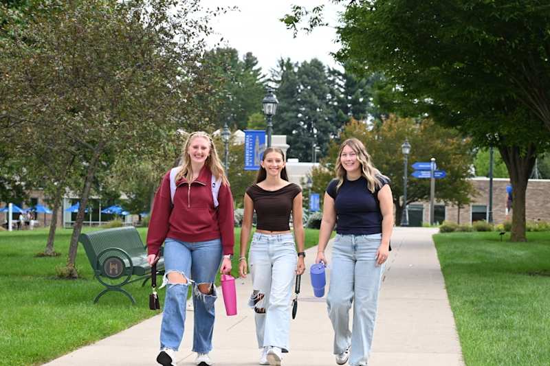 Misericordia University students walking together on campus