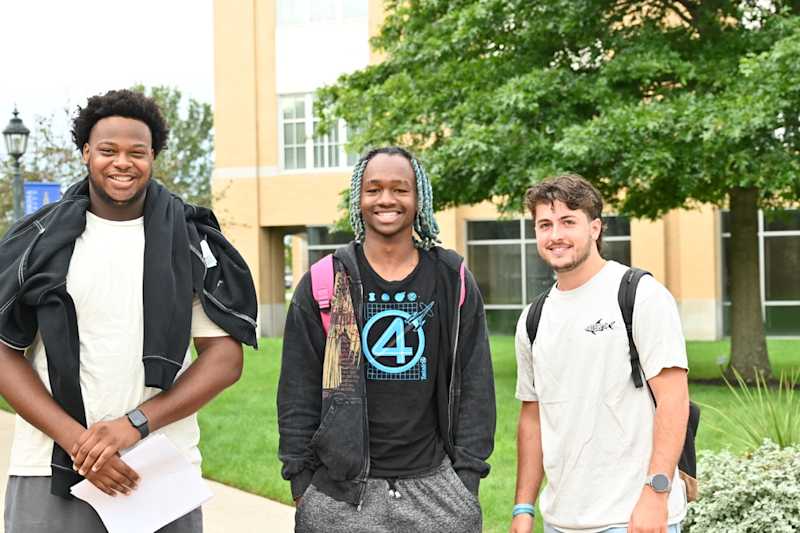 Three Misericordia University students together on campus