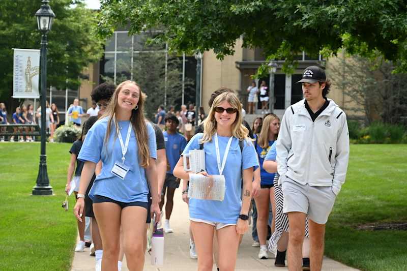Students walking together near Insalaco Hall at Misericordia University