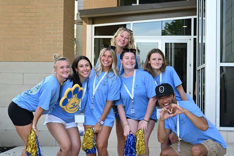 Misericordia University student leaders welcoming visitors to campus