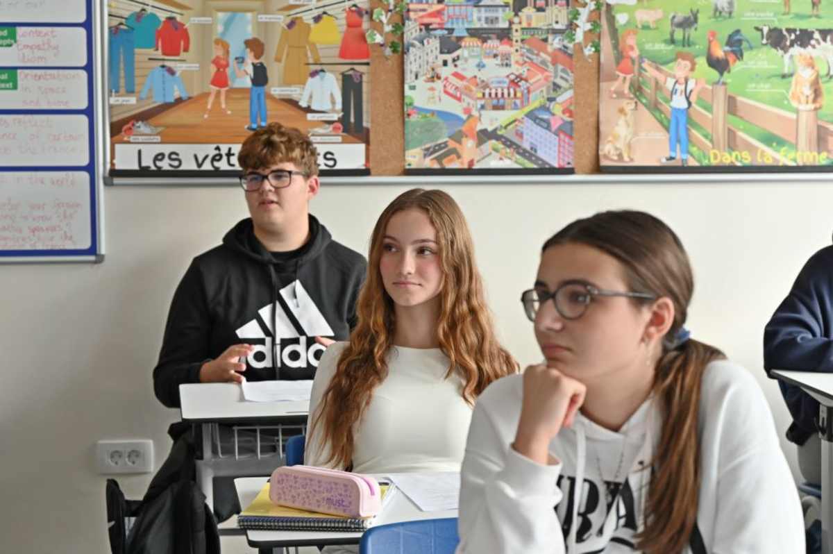 Secondary students listening during a class discussion