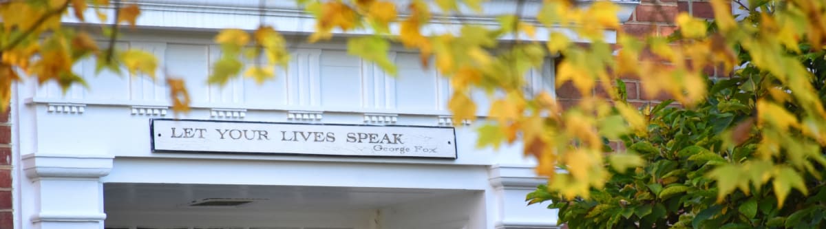 let your lives speak sign over building entrance