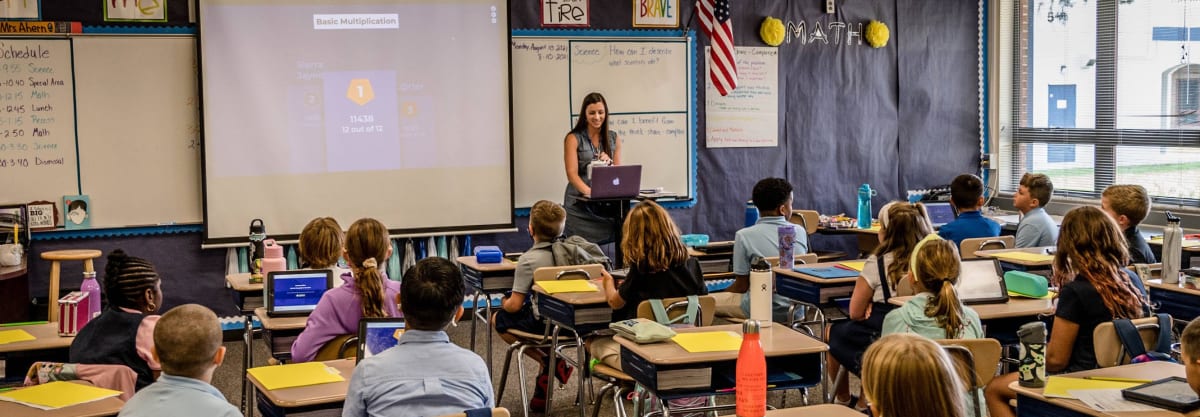Teacher and Students in Classroon